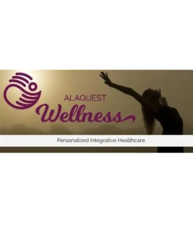 A woman is standing in front of the word wellness.
